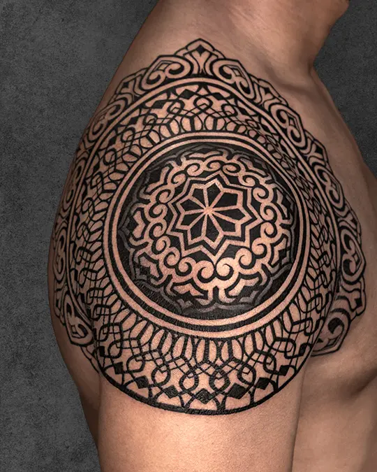 beautiful mandala tattoo on shoulder
