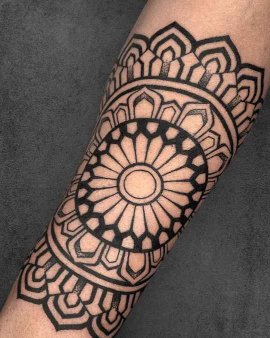 mandala tattoo on arm