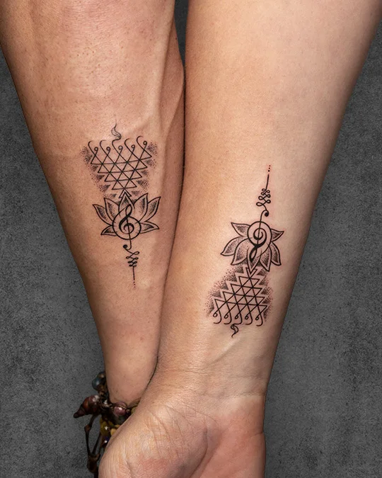 couple saraswati yantra tattoo