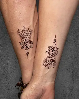 couple saraswati yantra tattoo
