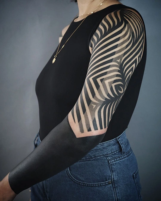 tribal and blackwork tattoo