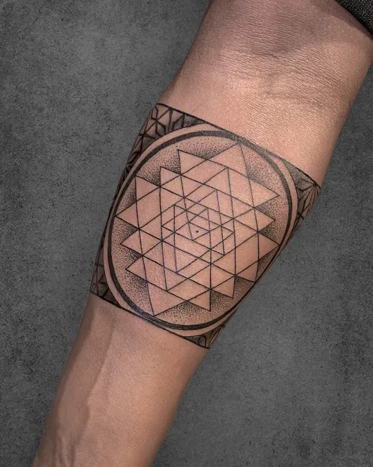 sri yantra in armband tattoo