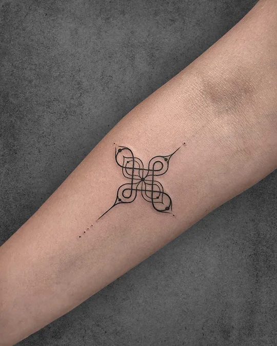 minimalist celtic knot tattoo