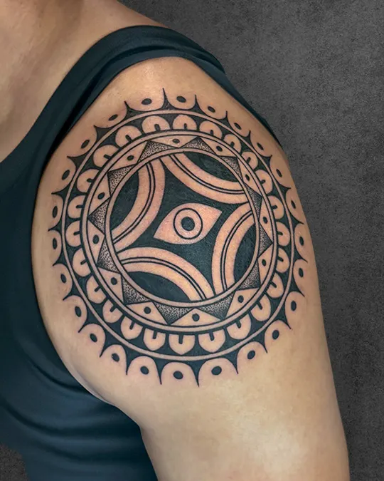 evil eye mandala tattoo on shoulder