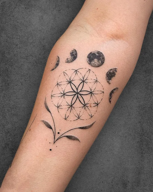 phases of moon and seed of life tattoo