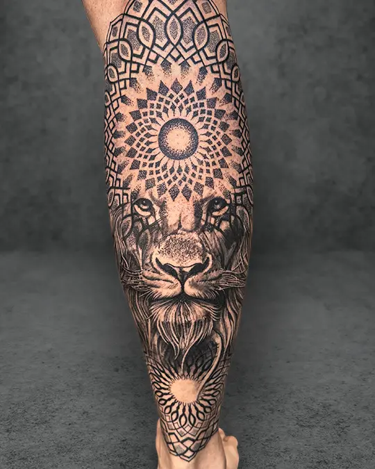 mandala and lion face dualism tattoo