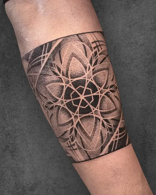 sacred armband tattoo