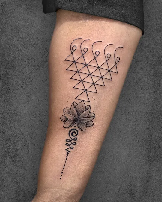 unalome and minimalist saraswati yantra tattoo