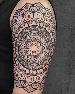 mandala and dotwork tattoo