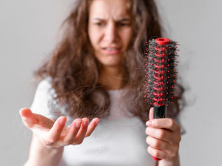 How does hair loss happen and what are the best remedies to combat it?