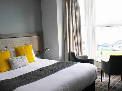 Luxurious Boutique Sea View rooms are light and airy,
with stunning views that will take your breath away.
These rooms have a substantial king size bed and a full en-suite bathroom, some with a bath and thermostatic overhead shower, and some with a walk-in shower.