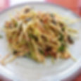 Green mango salad, roasted coconut and peanuts
