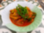 Pork curry with taro stems and acacia leaves