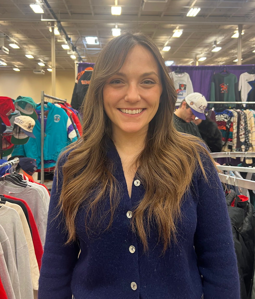 Roni, owner of Veronica VNTG, vending across from BeeFour Collectibles