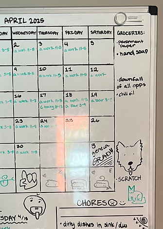 My eclectic college whiteboard calendar with an important date on Saturday, May 3