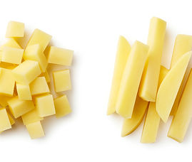 Set of fresh whole and sliced potatoes isolated on white background. Top view.jpg