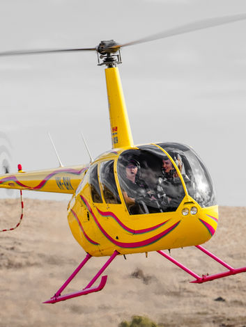 Close-up of sleek Barossa Valley tour helicopter with our professional pilots, highlighting premium safety and luxury aerial wine tour experiences from Adelaide, Australia.