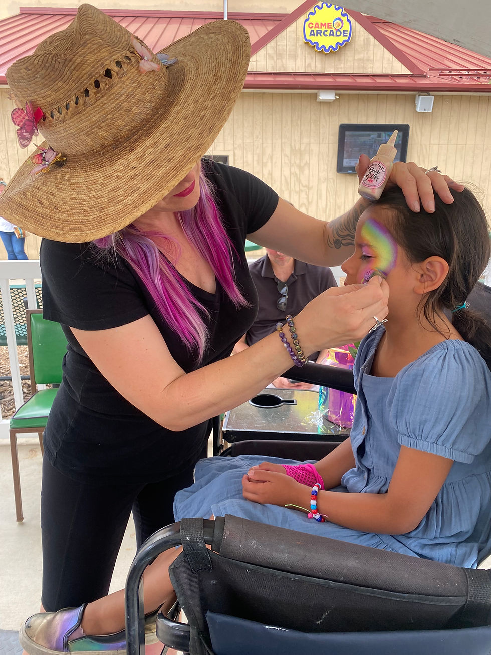 Stella Painting a childs face