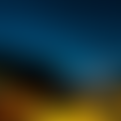 Tents glow under a clear night sky beside dark mountain silhouettes.