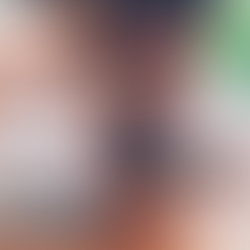 A child is smiling while putting a coin into a glass jar labeled "SAVING."