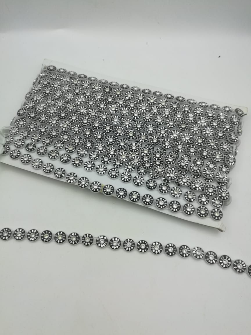 Miniatura: Stras Plastico con piedrita . rollo de 9 metros