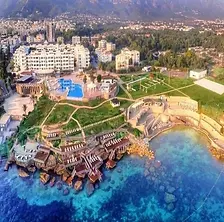 Jasmine Court Hotel with large pool area and landscaped gardens.