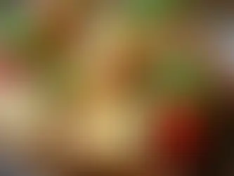 Eye-level view of a platter featuring halloumi and fresh vegetables