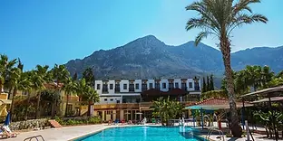 Simena Holiday Village family resort with gardens and spacious pool.