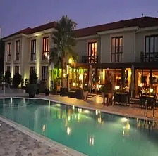 Bella View Hotel with panoramic mountain views and elegant terrace restaurant.