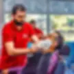 Traditional Turkish barber shop in North Cyprus with barber giving a shave
