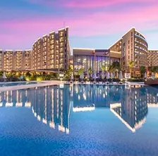 Elexus Hotel luxury resort with infinity pools and panoramic coastal views.