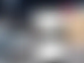 Smartphone displaying a structured online car marketplace for Northern Cyprus with vehicles listed for sale.