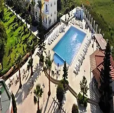 Mountain View Hotel with scenic mountain backdrop and outdoor swimming pool.