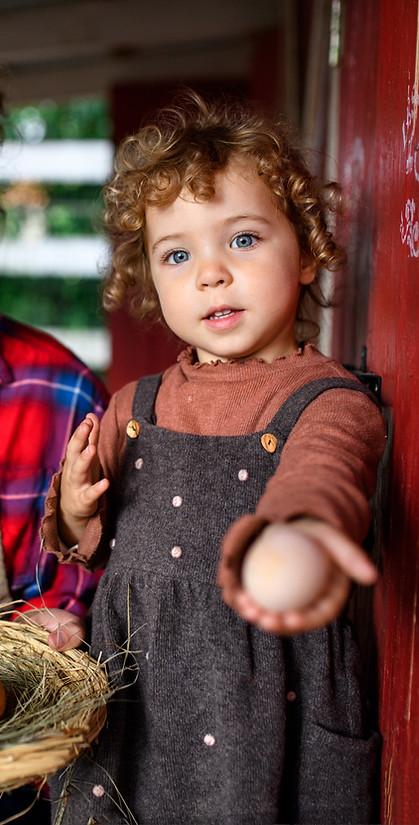 portrait-of-mother-with-small-daughter-standing-on-2024-10-18-09-48-03-utc.jpg