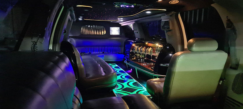 Inside the F250 Hummer Stretch Limousine night time