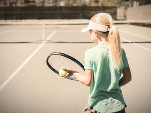 A young girl returns to the tennis court every day, embodying excellence not through perfection, but through habit, rhythm, and presence