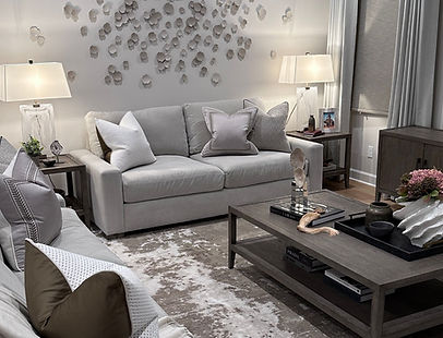 A luxury family room in Irvine, California in serene calm tones and warm neutrals designed by Memia Interiors