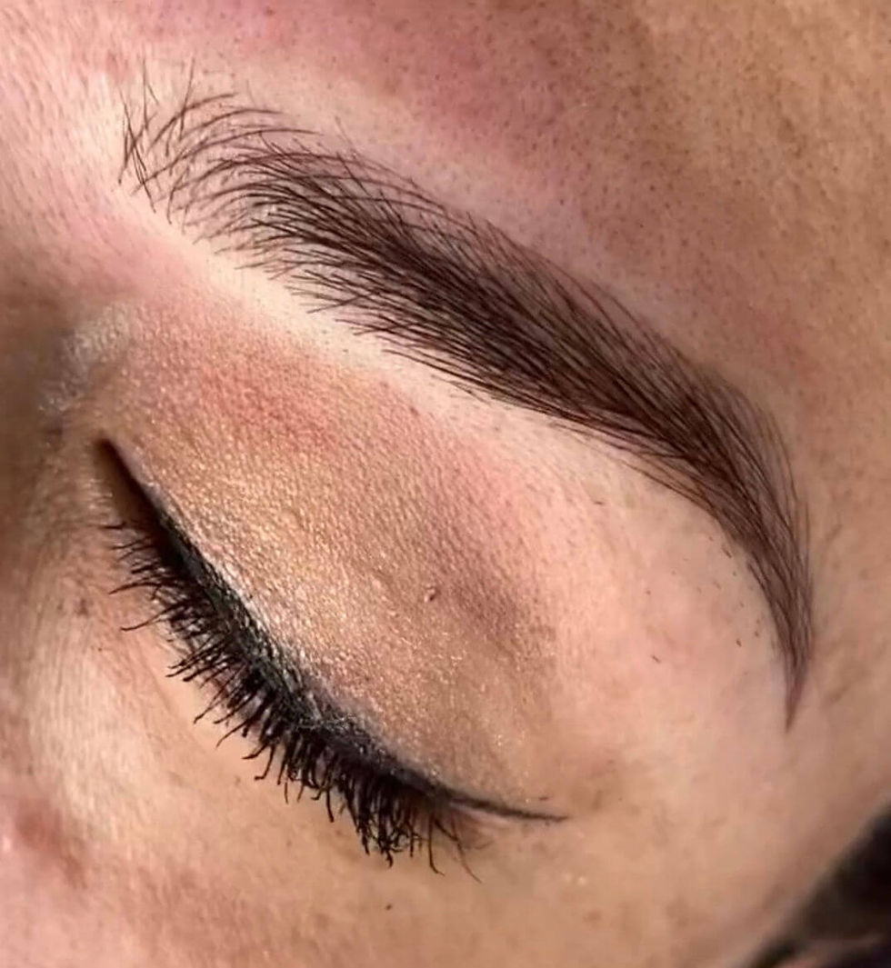 Permanent makeup eyebrows showing long-lasting cosmetic results.