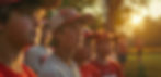 young-baseball-players-standing-line-golden-hour.jpg