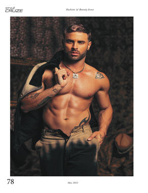 an image of a male model wearing Roberto cavalli jacket and pants. Published by style Cruze magazine. 
