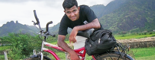 Mr. Atirup with his bicycle