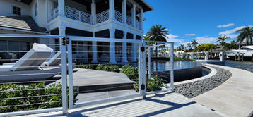 Alt Text: "Custom fabricated aluminum railing with 316 stainless steel cable system and powder coat finish for durability and modern style."

Keywords: custom aluminum railing, stainless steel cable system, powder coat finish, durable railing, modern railing design, custom railing system, 316 stainless steel railing, outdoor railing solution, aluminum railing with cable system.