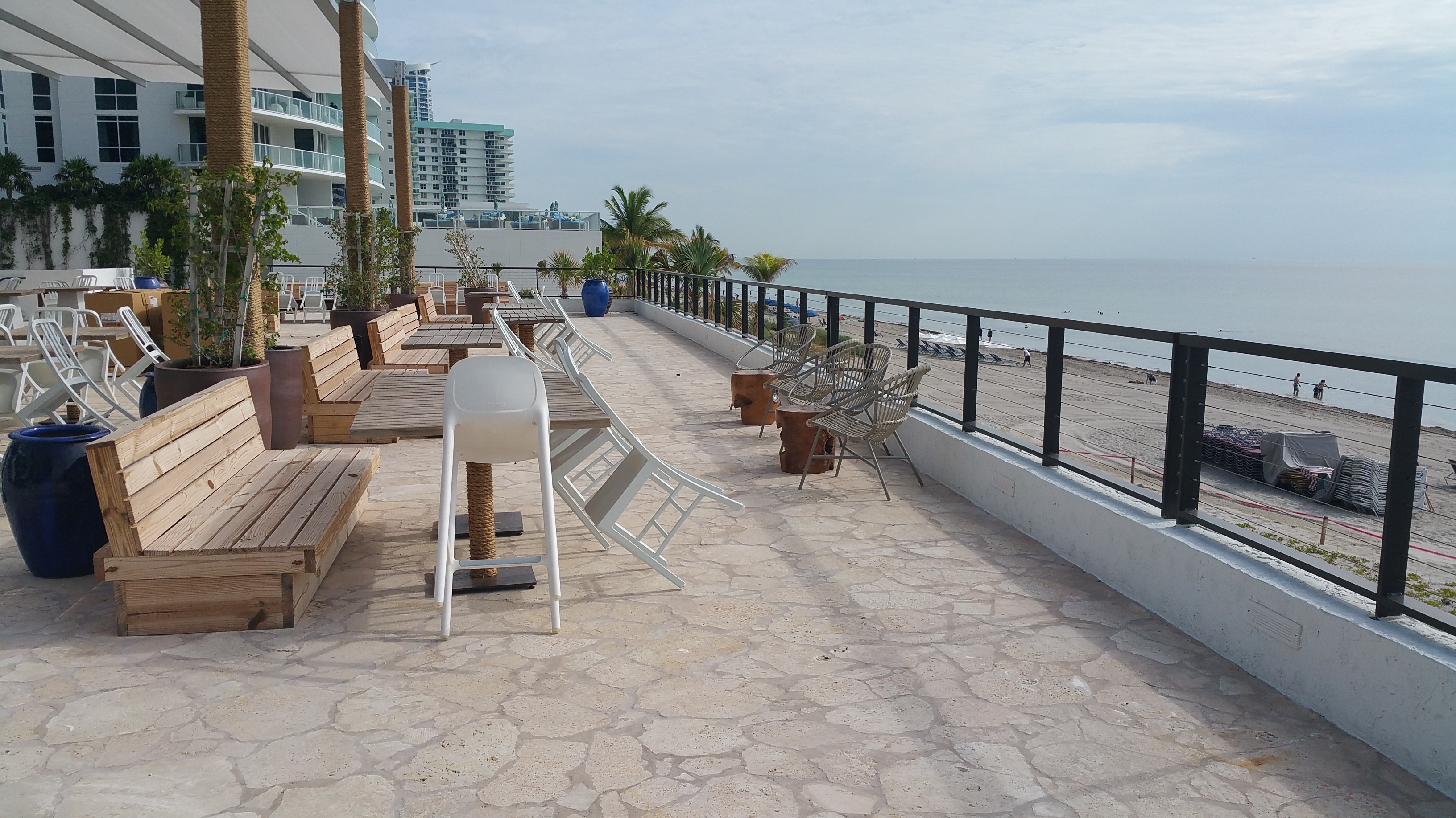 316 stainless steel cable railing along an oceanfront boardwalk at Hyde Beach, Hallandale Beach, FL — Modern Concepts of South Florida installation