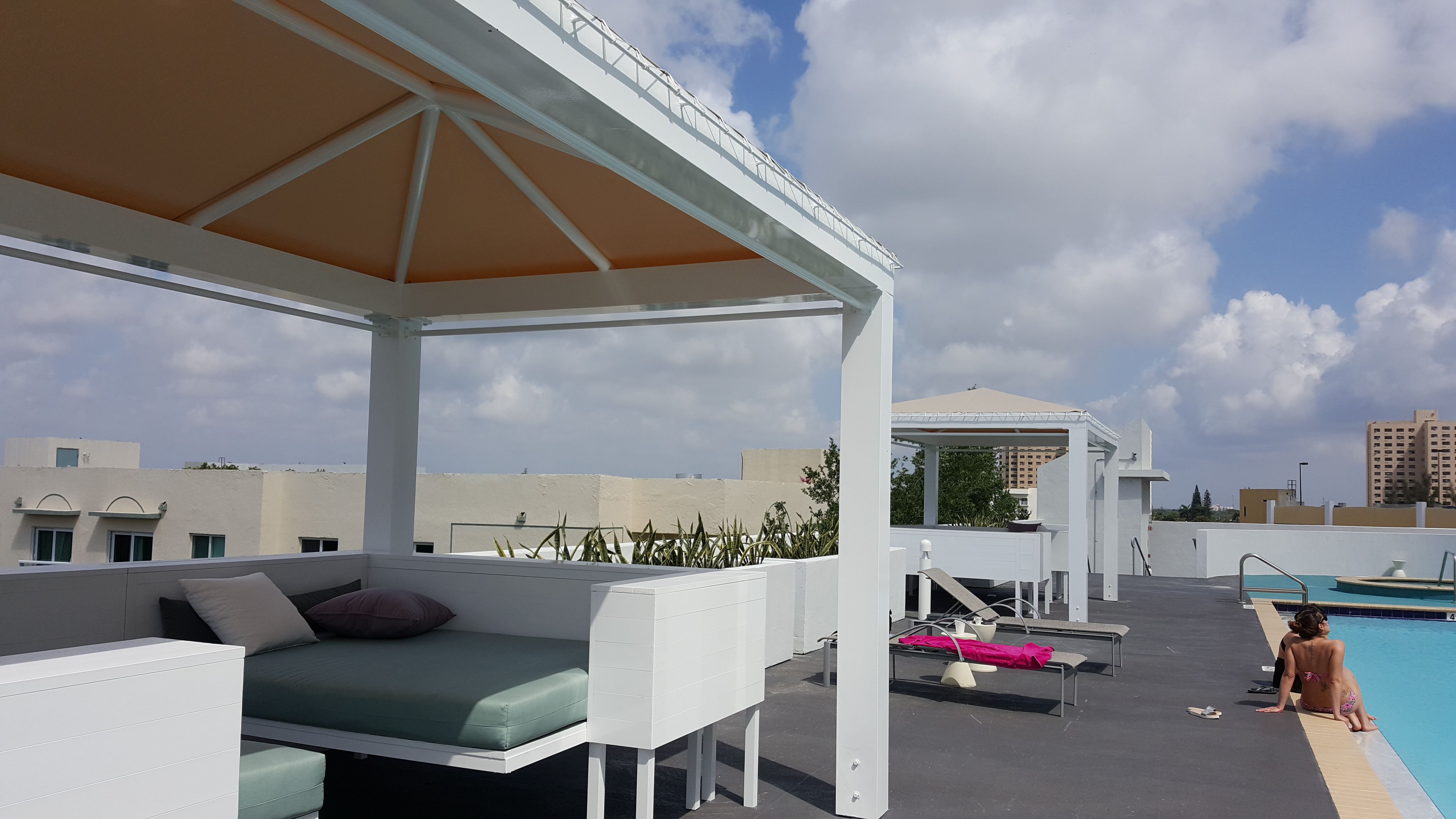 Custom canopy and outdoor seating, pool deck remodel
