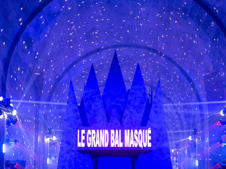 The illuminated Orangerie at Château de Versailles during the Grand Masked Ball at night.