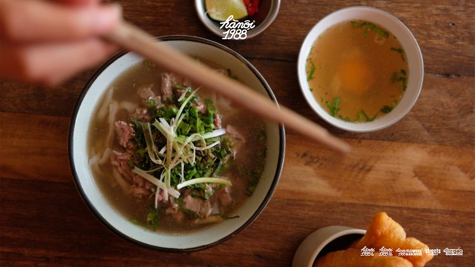 Authentic Vietnamese pho in Paris with sliced beef, rice noodles, herbs and hot broth served at Hanoi 1988 Vietnamese restaurant