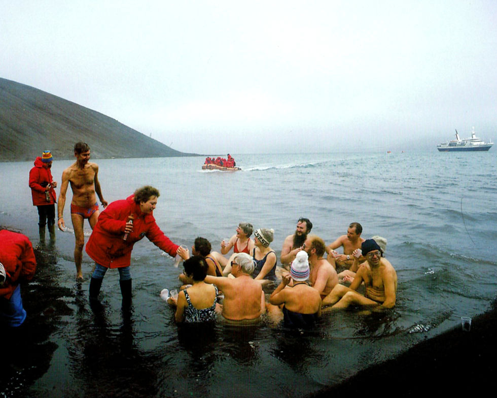 The circular rim of an ancient volcano forms Deception Island. Geothermal activity heats the water enough for tourists to plunge in. Barry takes fun, sometimes morbid, liberty with this fact.