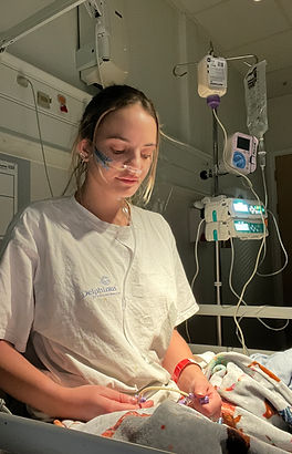 UCLH pic in hospital bed with tubes