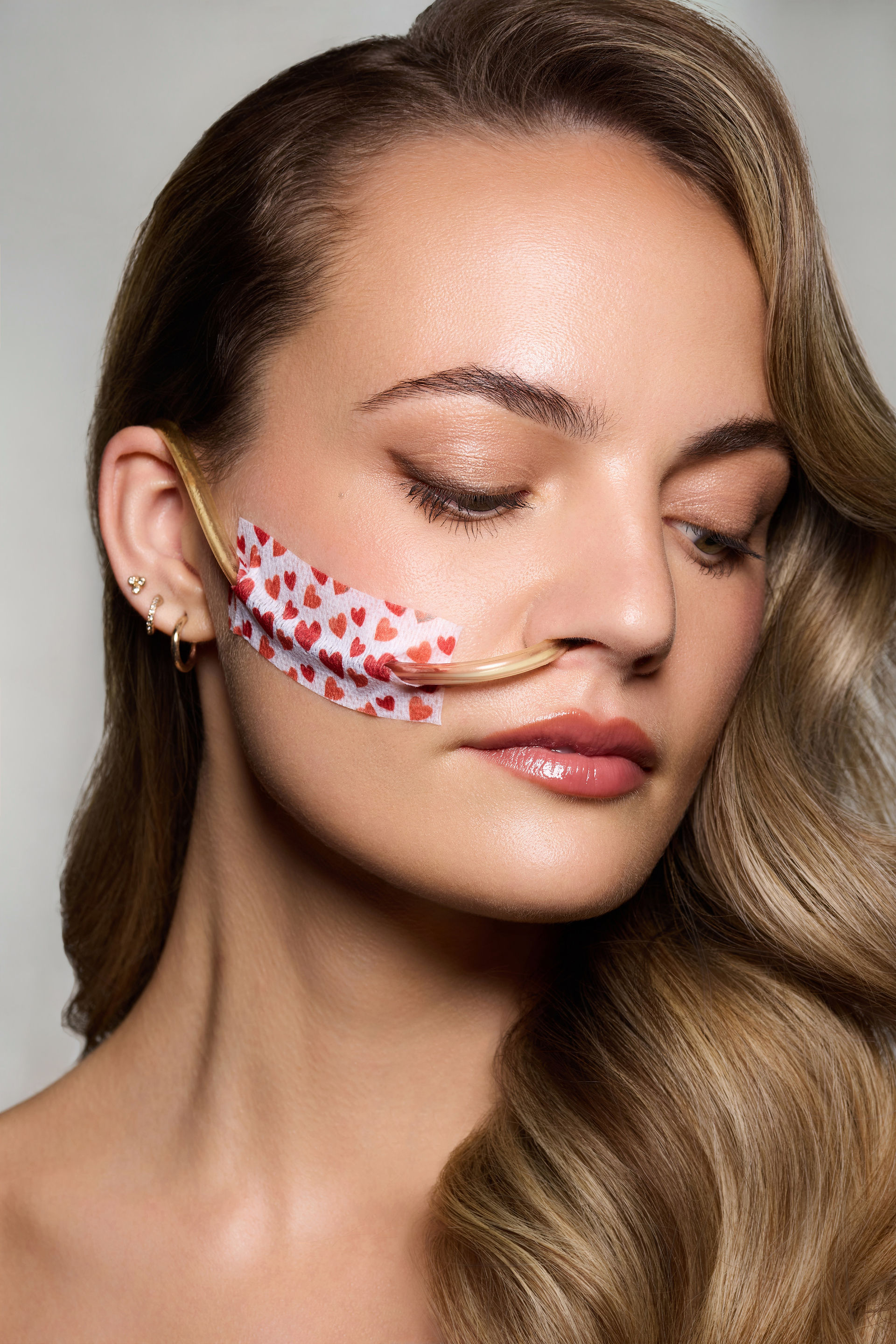 Millie wearing heart tape
