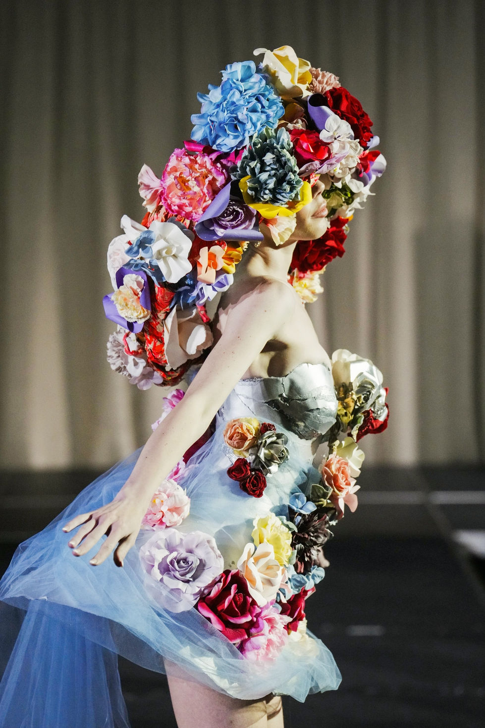 A multicolour rose gown with a pink floral headpiece. A Curl Paper look, with creative direction and styling by Tamarra McNaught, founder of TITO STYLE, at The Hotel Windsor, Melbourne, Australia.